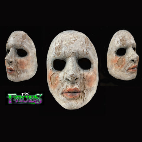 Cracked doll slip latex mask. Has to 1/2 elastic straps attached for easy on easy off.